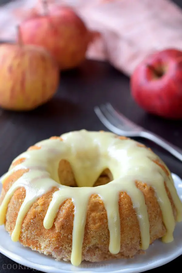 Apple bundt cake with white chocolate on top. Are you searching for apple coffee cake? This apple bundt cake is perfect for pairing with your morning coffee or tea. Mini bundt cake recipe for one.