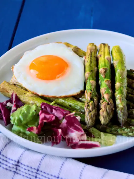 Roasted asparagus with fried agg and salad