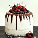 Chocolate Cherry Layer Cake (Birthday Cake) on a black table