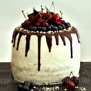 Chocolate Cherry Layer Cake (Birthday Cake) on a black table