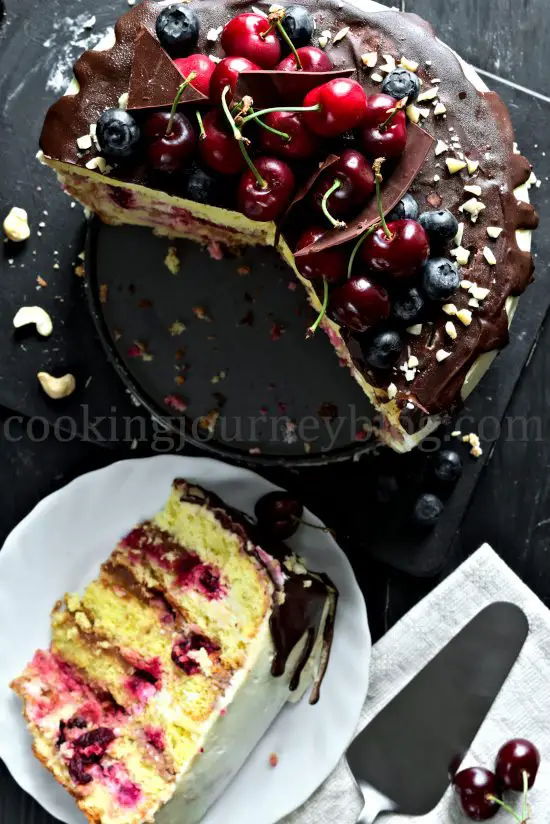Chocolate Cherry Layer Cake (Birthday Cake), cut, multiple layers on a plate