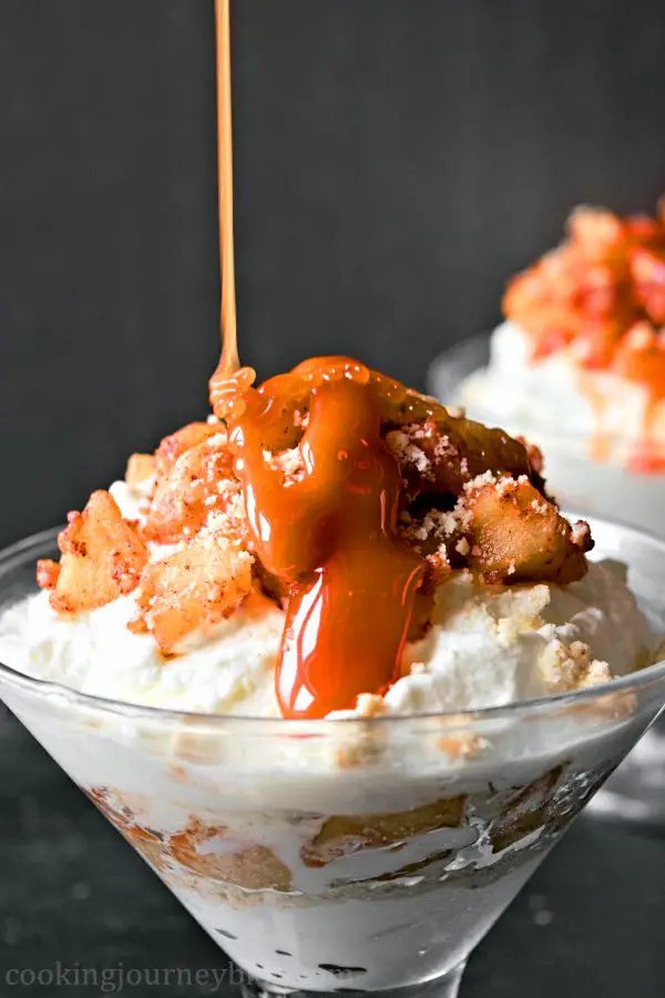 Pouring homemade caramel on apple trifle