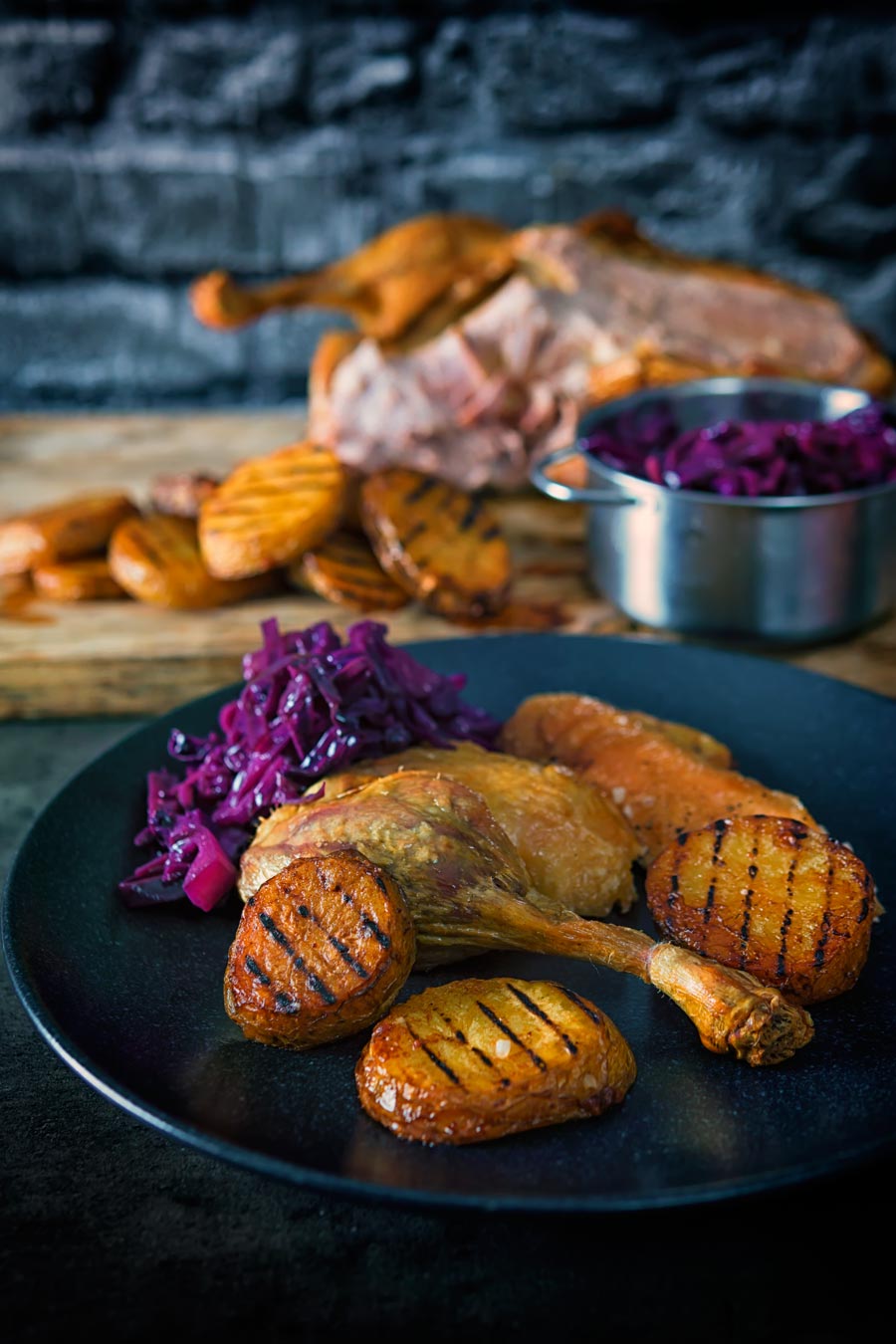 Whole Roast Duck With Scalloped Potatoes and Red Cabbage
