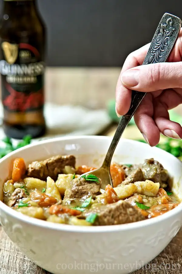 Eating Irish Beef and Guinness Stew with a spoon