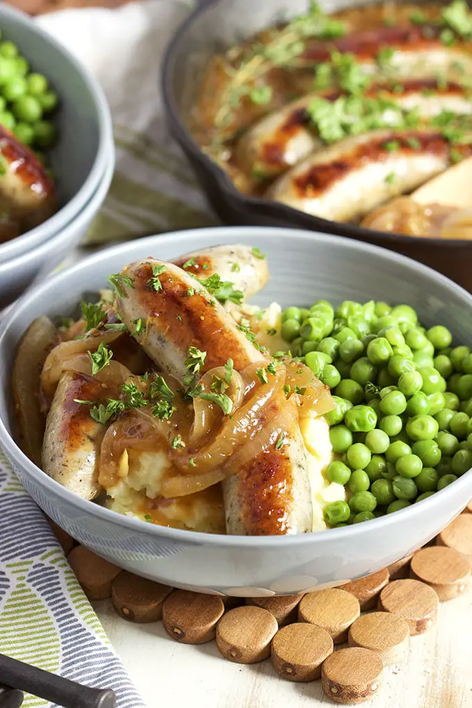 Bangers and Mash served with peas