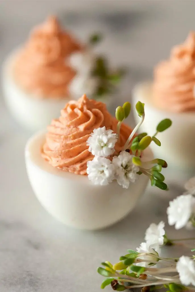 Pink Easter Deviled Eggs with flowers