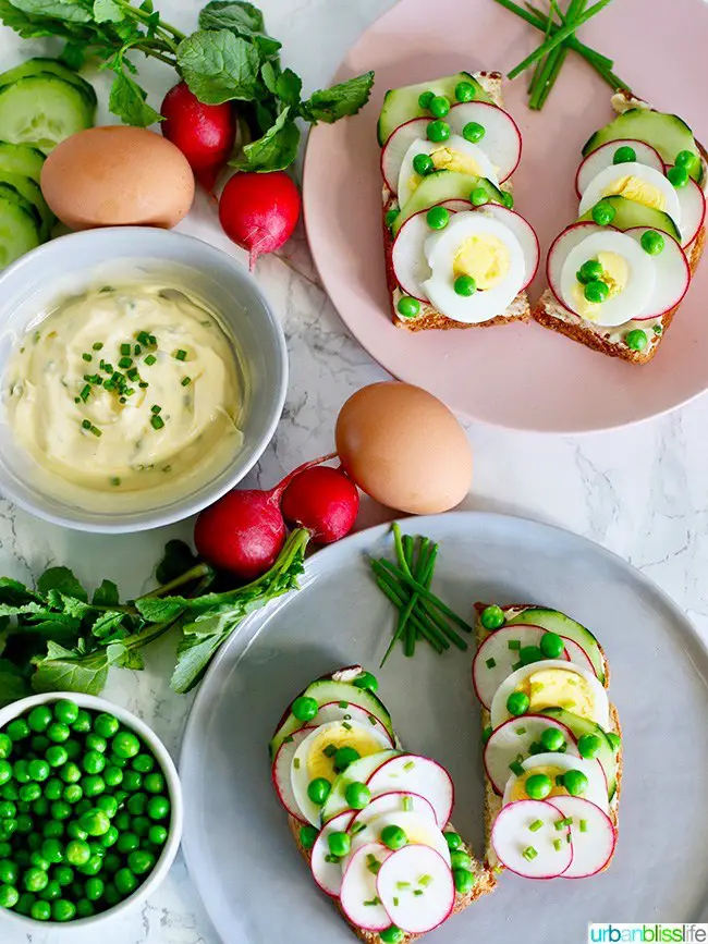 Spring veggies - radishes, peas, and cucumbers on a Spring Crudité Toast with eggs 