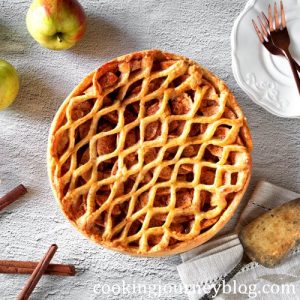 Traditional Dutch apple pie recipe with pie crust on top.