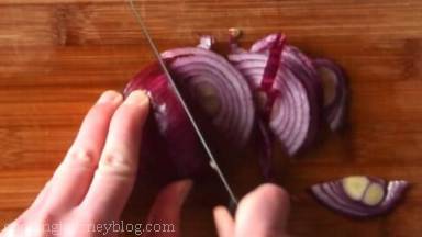 Cut red onion into slices and add to the bowl.