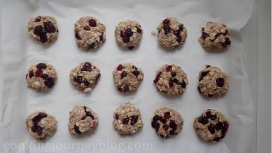 Use your hands to form a small ball from the oat mixture. Place the balls on the tray, leaving a space about an inch in between. Press every ball with your finger to form the cookies.