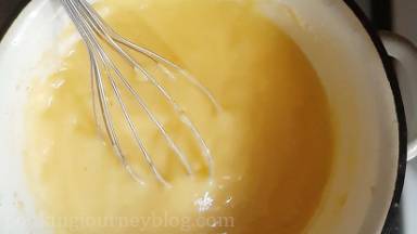 Put the bowl with lemon mix on a pot with boiling water or Bain Marie. Cook on a low, constantly whisking for about 10 minutes or until you lemon curd thickened.