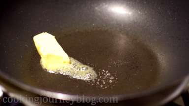 Melt butter in a hot pan on a medium heat.