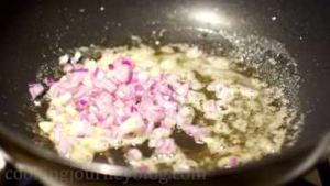 Add chopped garlic and onion. Brown for few minutes, stirring with a spatula or spoon.
