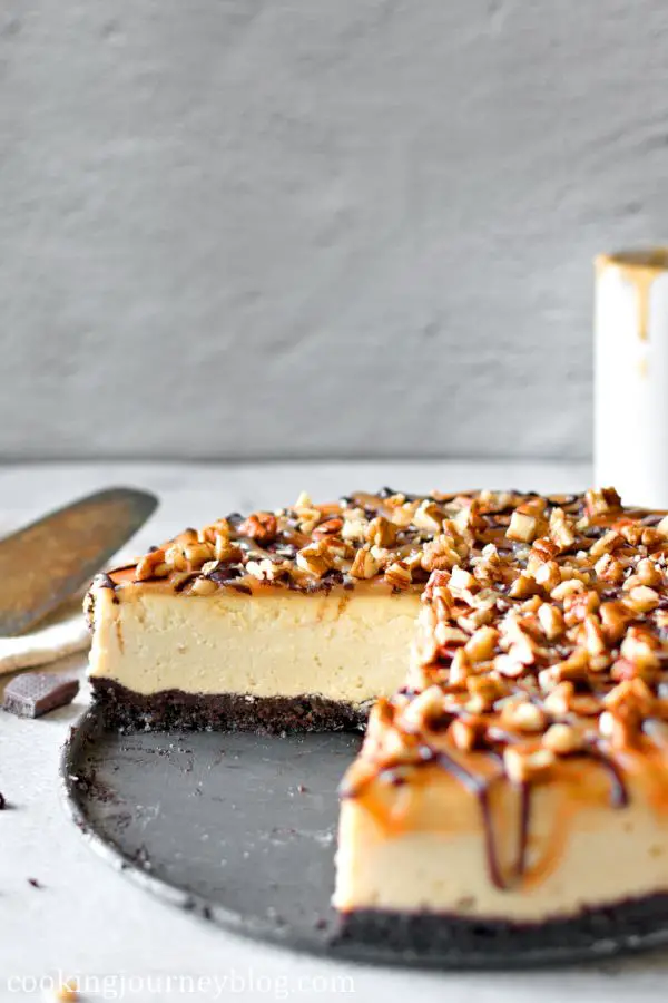 Cut Turtle Cheesecake and the caramel sauce
