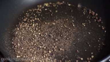 Add grind peppercorns to the large pan.