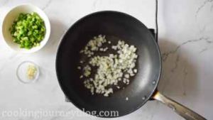 Add olive oil to the clean large pan or wok, placed on the medium heat. Add chopped onion.
