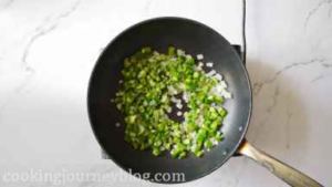 Add chopped green bell pepper, stir together. Cook 2-3 minutes.