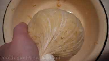 Place grated potatoes in a cheese cloth and squeeze as much liquid as possible.**
