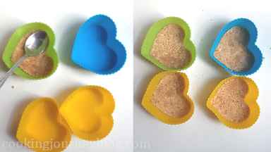 Distribute biscuit mixture to silicone heart molds and press with the spoon. Put in the refrigerator.