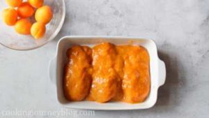 Put chicken breasts in a baking pan. Glaze the chicken and pour all the sauce on top.