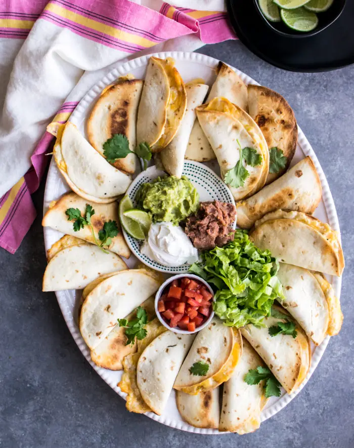 Chicken quesadilla served on the wide plate