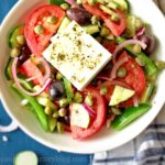 Horiatiki Greek salad served in a bowl, view from top