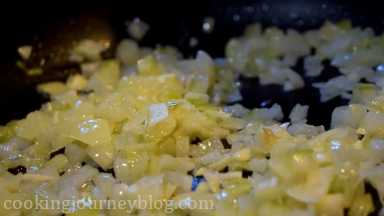 In a pan cook onions with garlic on a medium heat for 5 minutes.