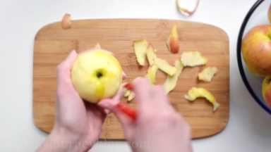 Clean and peel all apples. Use your knife or apple peeler.