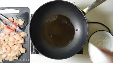 Heat oil in the large pan.