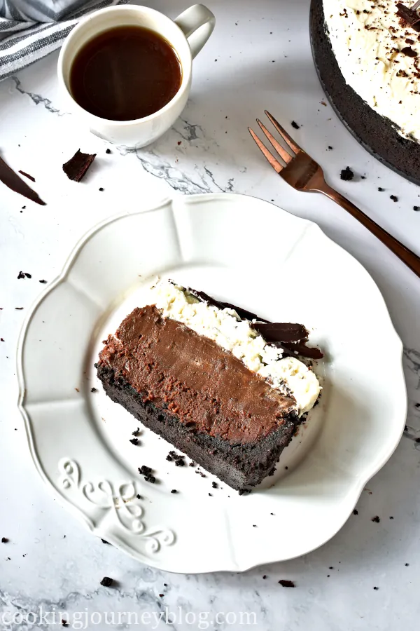 A slice of Mississippi Mud Pie served with coffee
