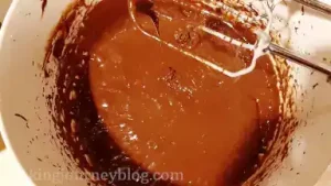 Beat in chocolate mixture until just combined.