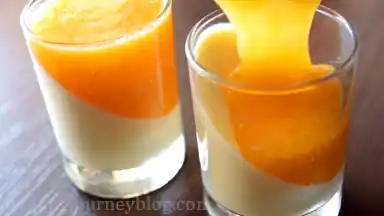Put the glasses under normal angle. Fill the remaining space in the glasses with persimmon puree. Leave to set in the fridge for about 1,5 hours or until set completely.