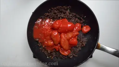 Add canned tomatoes.