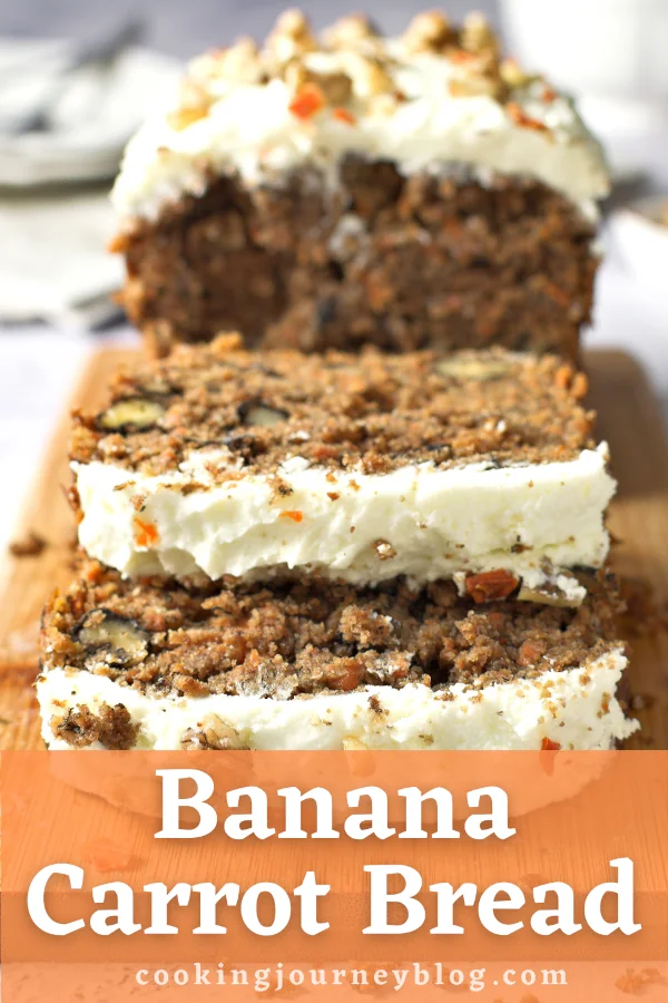 Banana Carrot Bread, with frosting, sliced and served on the board.