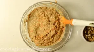 Fold in grated carrots.