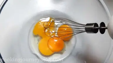 Whip egg and egg yolks for 5 minutes until thick and creamy.