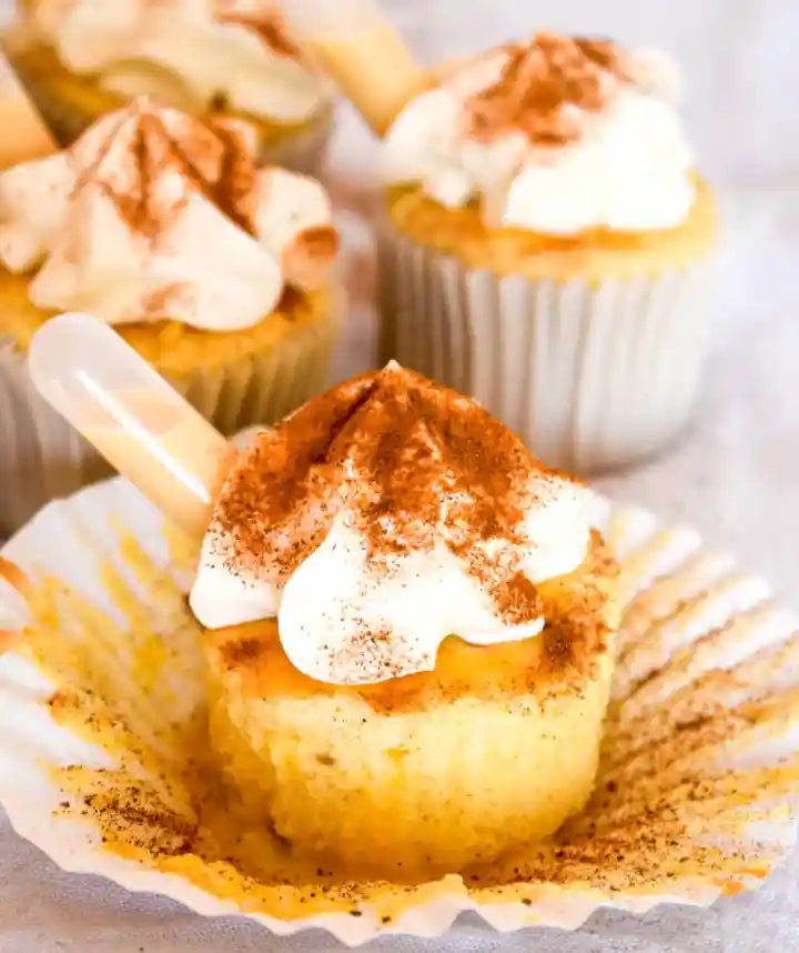 Tres Leches Cupcakes in paper liners