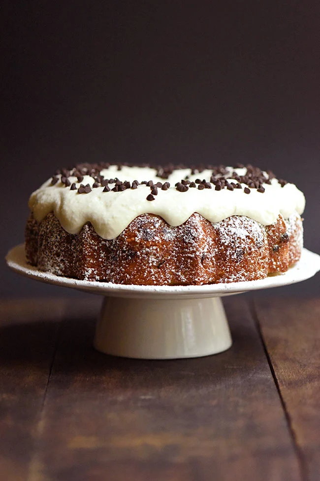 Bundt cake with frosting and chocolate chips