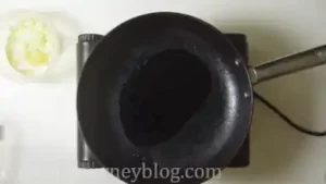 Heat oil in a clean pan.