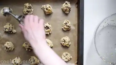 Form the balls with a scoop, and put them on the baking sheet.