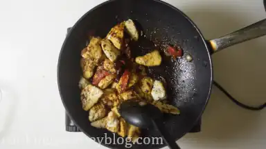 Add cooked chicken pieces back to the pan and cook together few minutes, stirring.