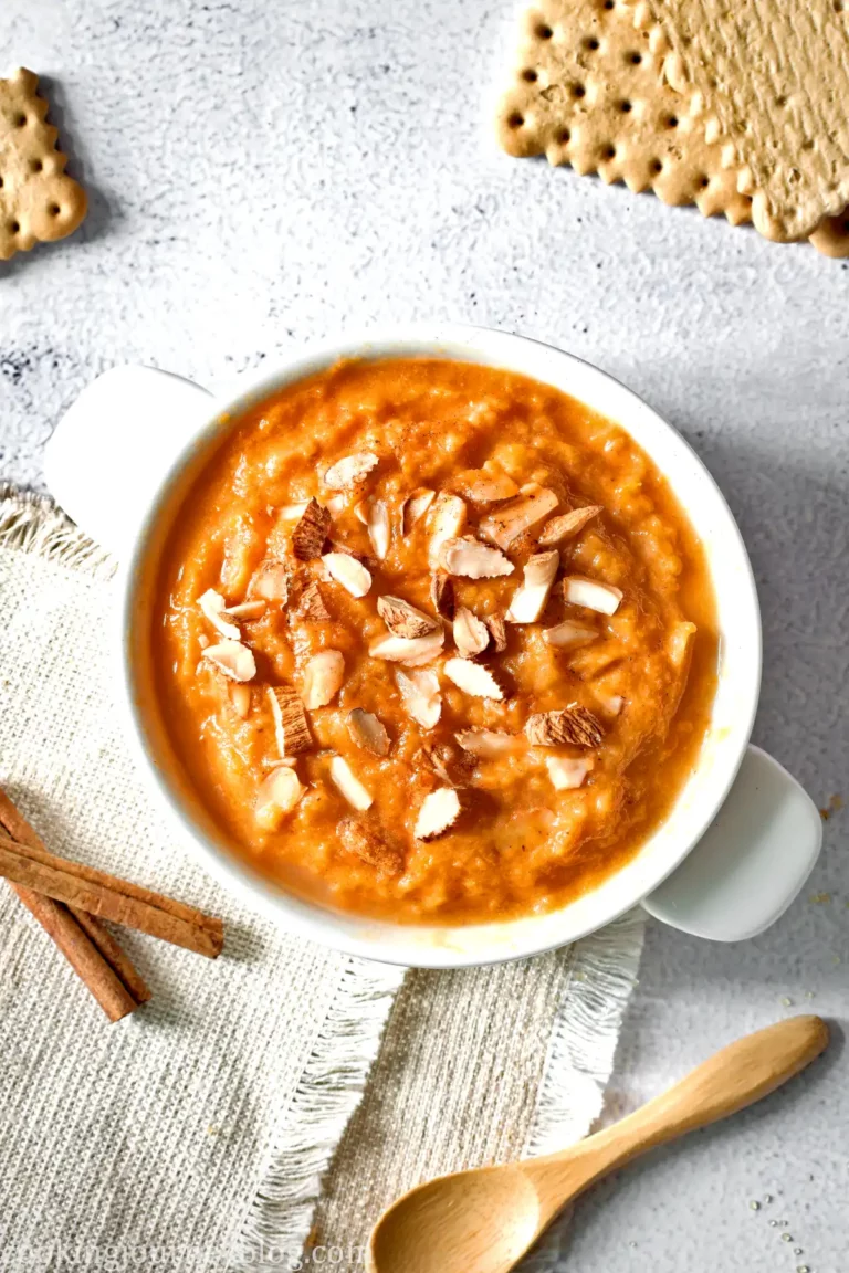 Mashed Sweet Potatoes With Brown Sugar, served with almonds in a white bowl