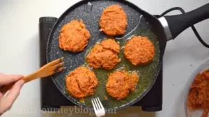 Meanwhile, on a medium heat the oil in a large pan. Form the cutlets from the sweet potato mix with wet hands. Fry 5 minutes.