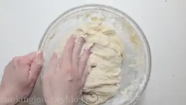 Knead the dough with hands. Add more flour, while kneading, if it is too sticky.