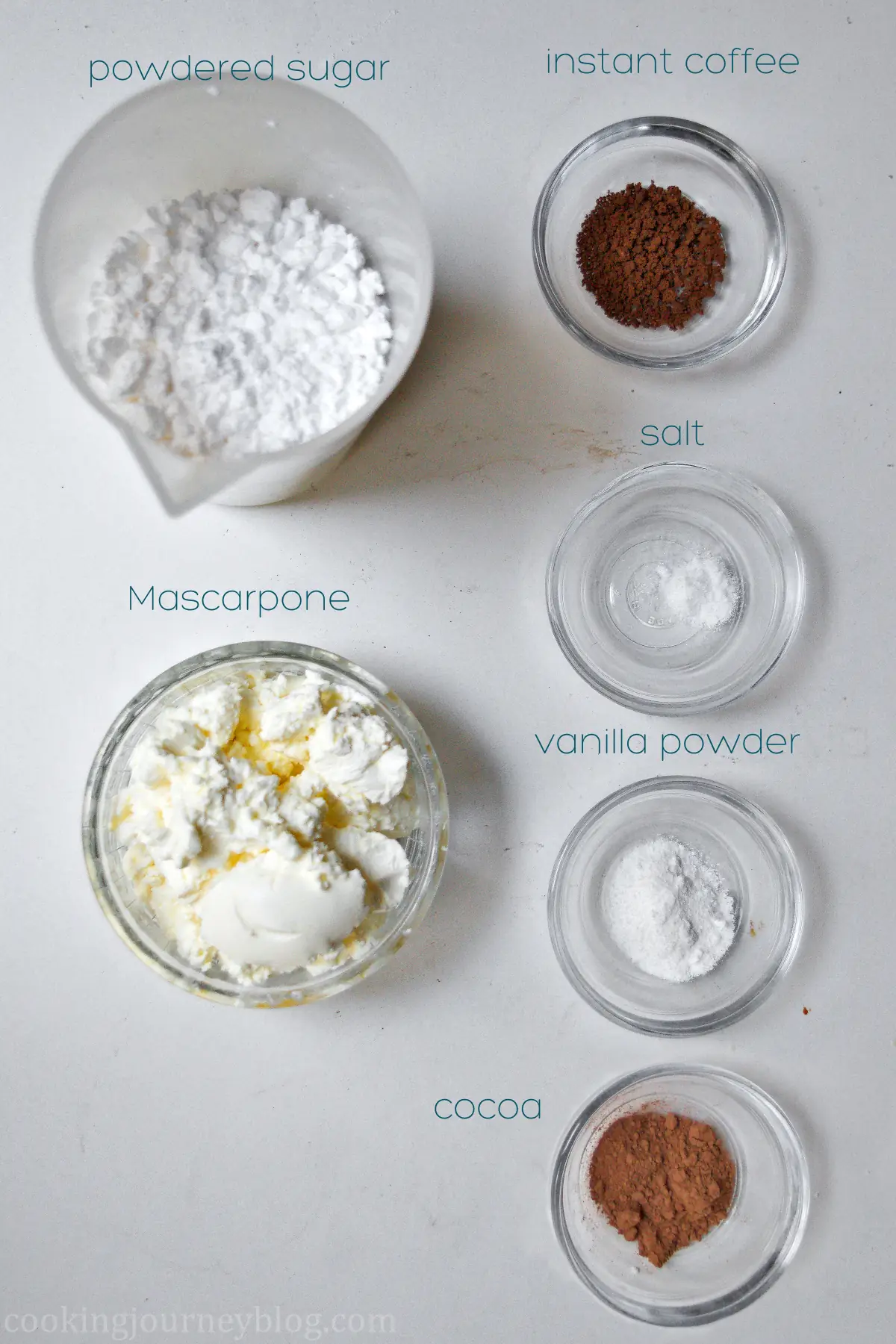 Tiramisu filling ingredients - powdered sugar Mascarpone cheese, granulated coffee, salt, vanilla powder and cacao powder.